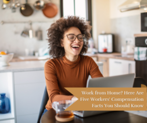 woman working from home laughing at her co-workers on the laptop