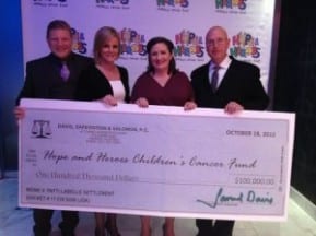 Davis, Saperstein & Salomon, P.C. donating check to New Jersey charity.