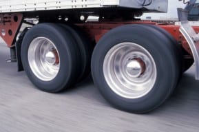 Tractor trailer truck tires roll off and break apart to cause New Jersey truck accident