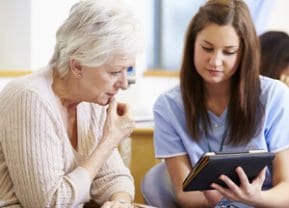 Patient and nurse reviewing side effects of Taxotere chemotherapy drug