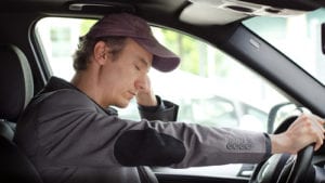 A drunk truck driver in a tractor trailer before causing a New Jersey truck driving accident