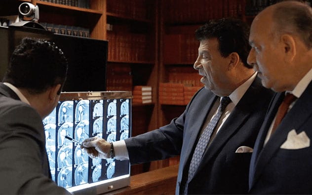 Lawyers analyzing MRI scans