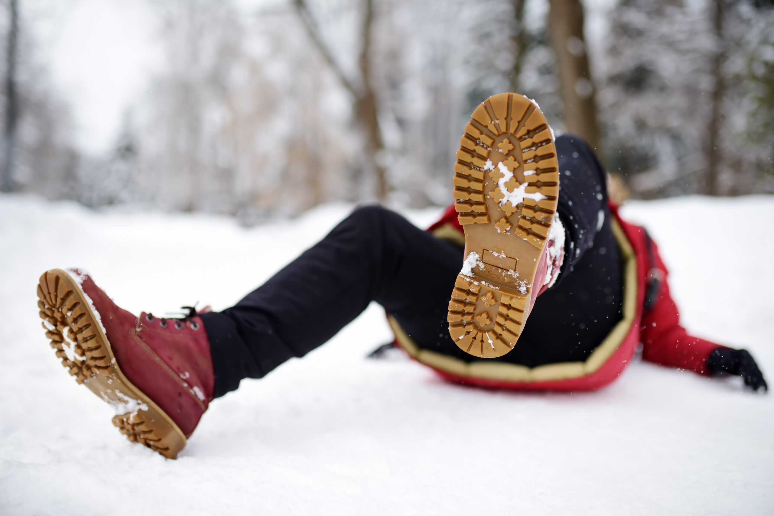 slipping and falling on ice in the winter