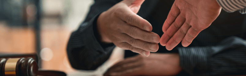 injured cyclist meeting with a bike accident attorney in New Jersey