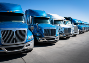 semi-trucks sitting in a parking lot in New York State