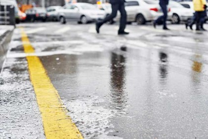 ice on sidewalk and roadway near Haledon, New Jersey