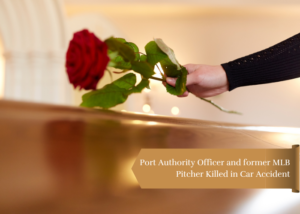 Woman putting a rose on top of a coffin