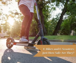 Young man riding an e-scooter