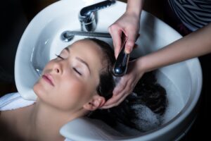 Woman getting a hair treatment