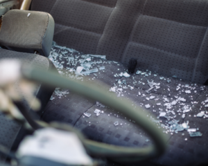 shattered glass on car seat after a car accident