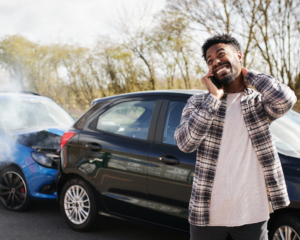 man's neck is injured when it bumped into the steering wheel during a car accident
