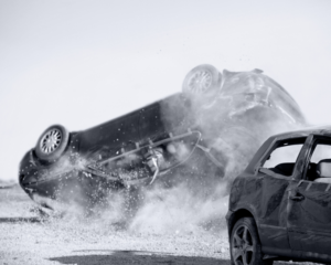 two cars turned upside-down after a car collision