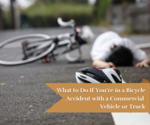 an injured cyclist lying on the road after a bicycle accident