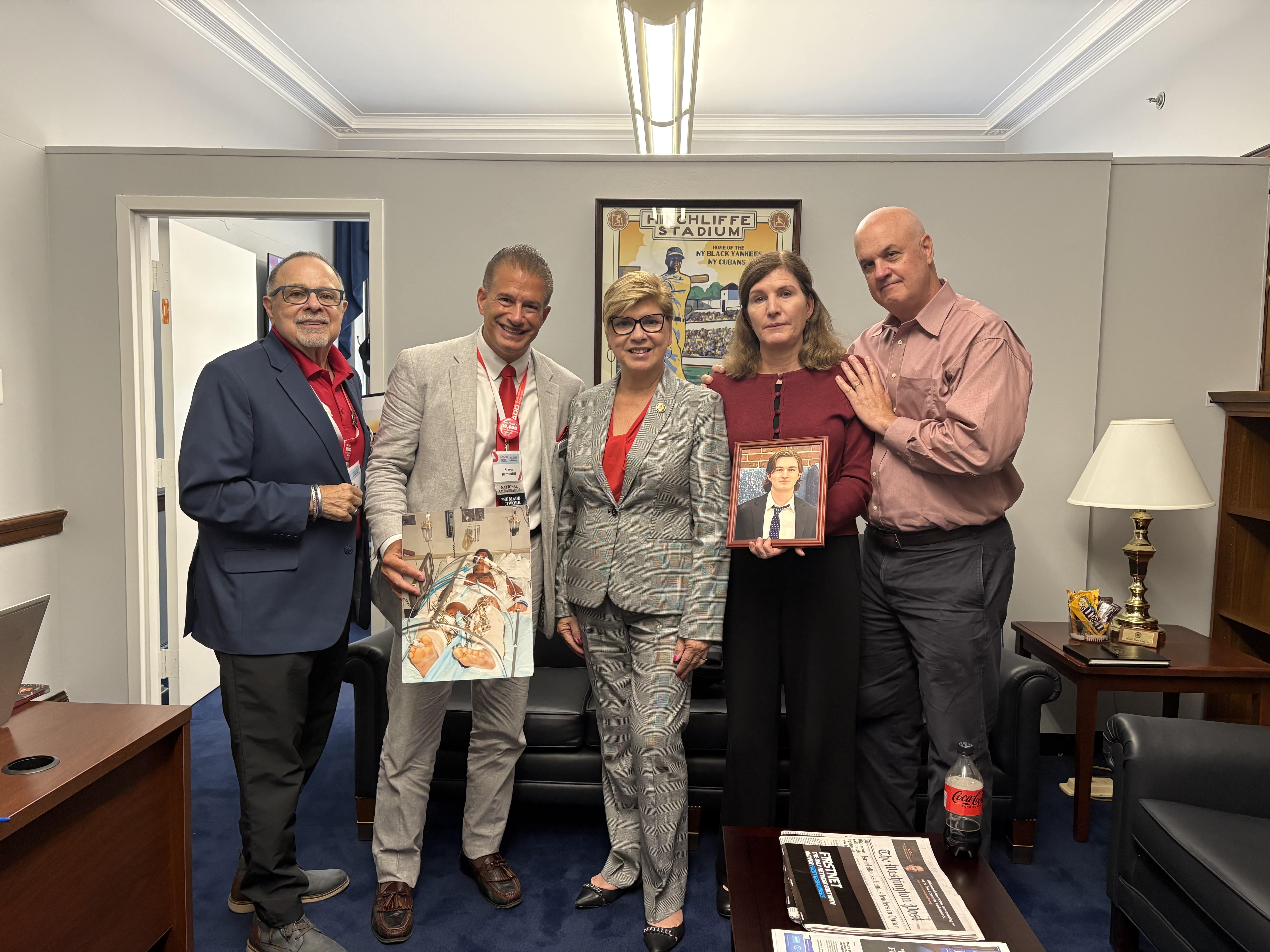 Steven Benvenisti in the frame with 4 other people